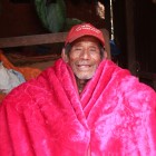 Dupha, wrapped in an emergency blanket supplied to him after the Nepal earthquake in 2012